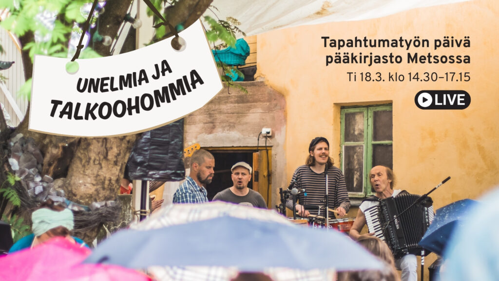 Unelmia ja talkoohommia -tapahtumakuva, taustalla bändi soittaa keltaisen kiviseinän edessä