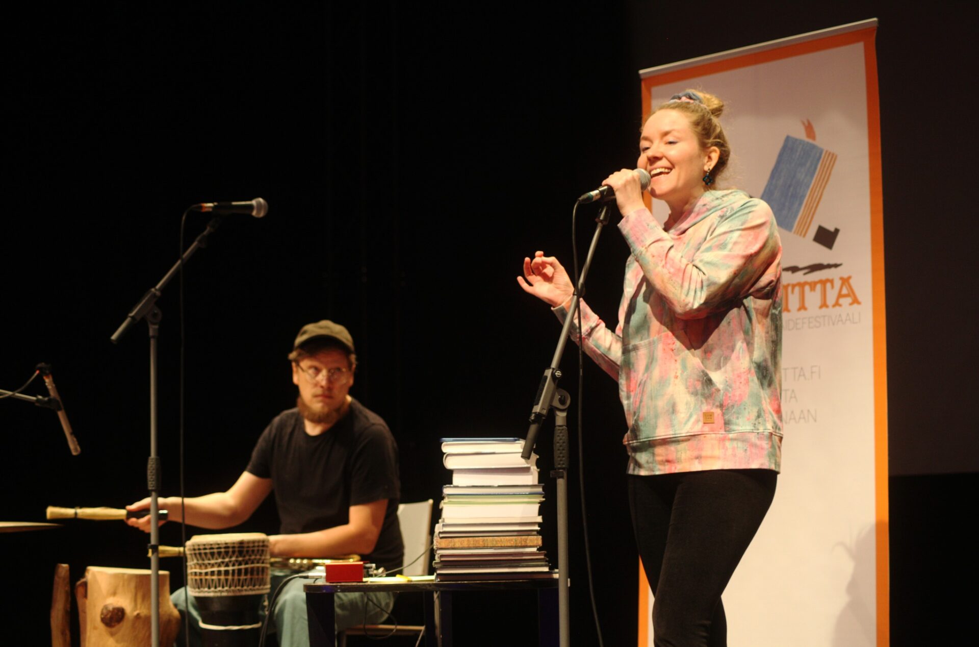 A man and a woman performing at the Kirjalitta Festival.